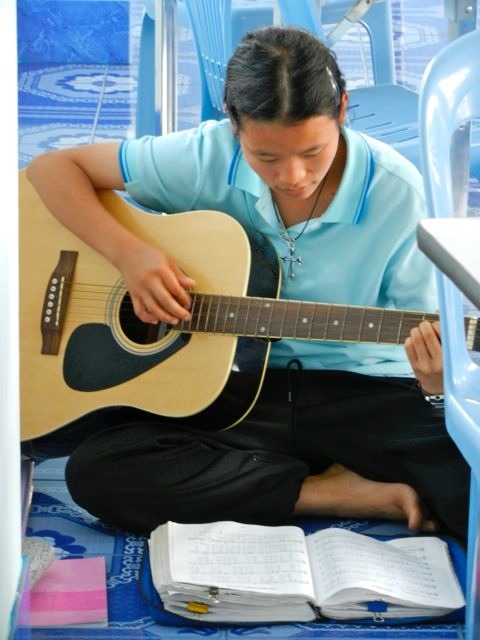 Good Shepherd Sisters - Chiang Rai taking break with guitar