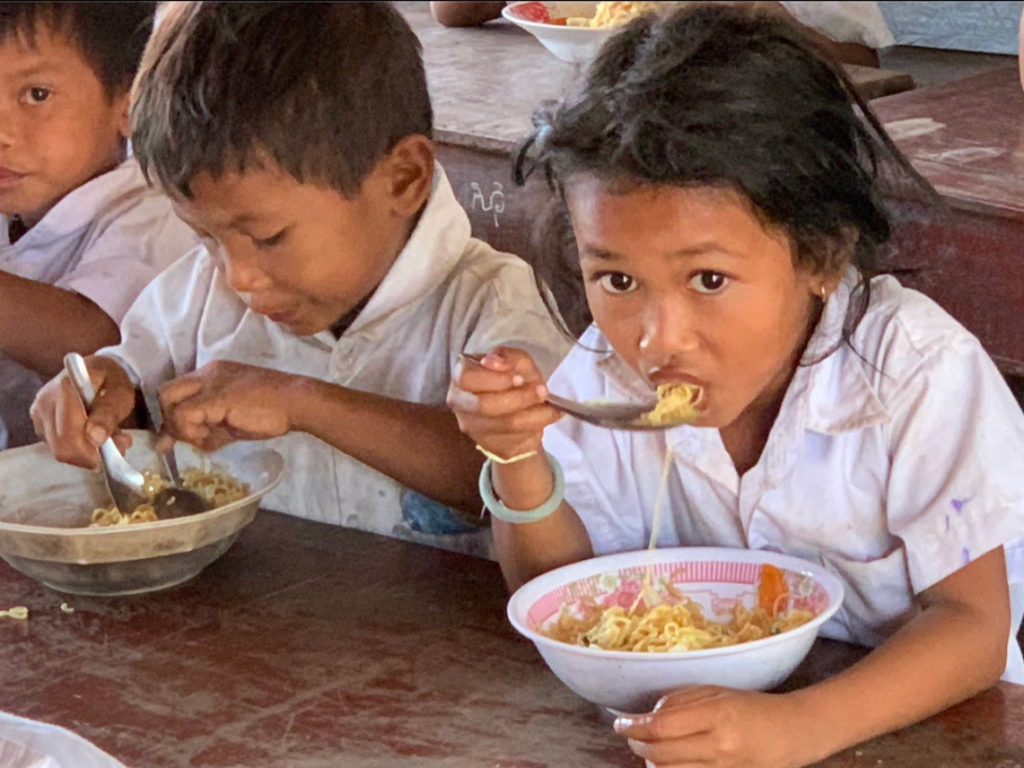 Children eating donated food